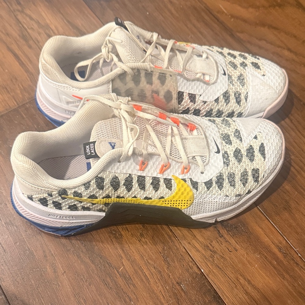 Nike Women's Metcon White Sneakers with Yellow Swoosh and Black Leopard Print